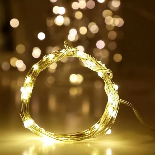 Гірлянда на батарейках Роса - 10 м., 100 LED діодів, провід гнучкий металевий, світіння Теплий білий (на ялинку, штору, вікно, стіну) — фото 3