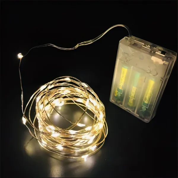Гірлянда на батарейках Роса - 10 м., 100 LED діодів, провід гнучкий металевий, світіння Теплий білий (на ялинку, штору, вікно, стіну) — фото 5