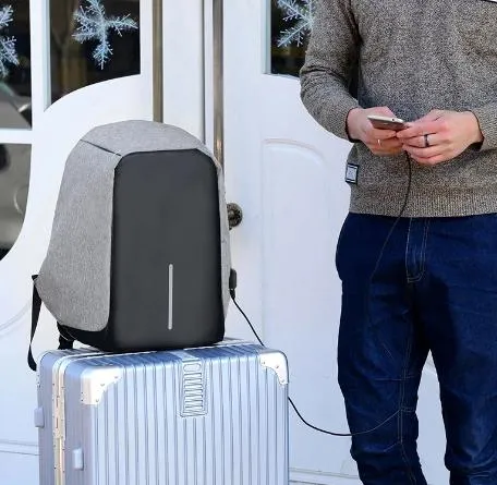 Рюкзак-антивор з USB - Сірий колір з кишенею для ноутбука або планшета і відсіком для особистих речей — фото 4